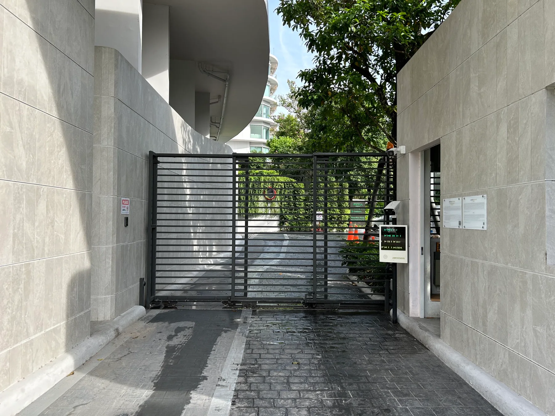 Daytime view of the secure condominium entrance